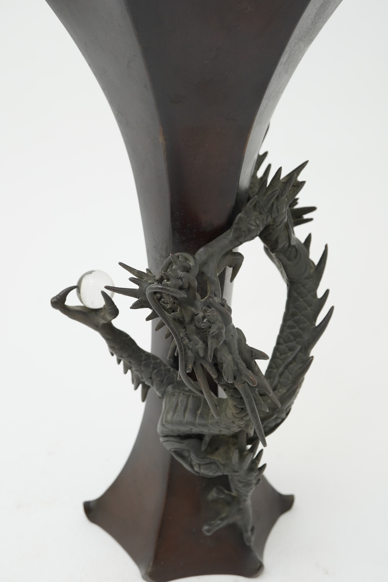 A Japanese bronze 'dragon' hexagonal beaker vase, Meiji period